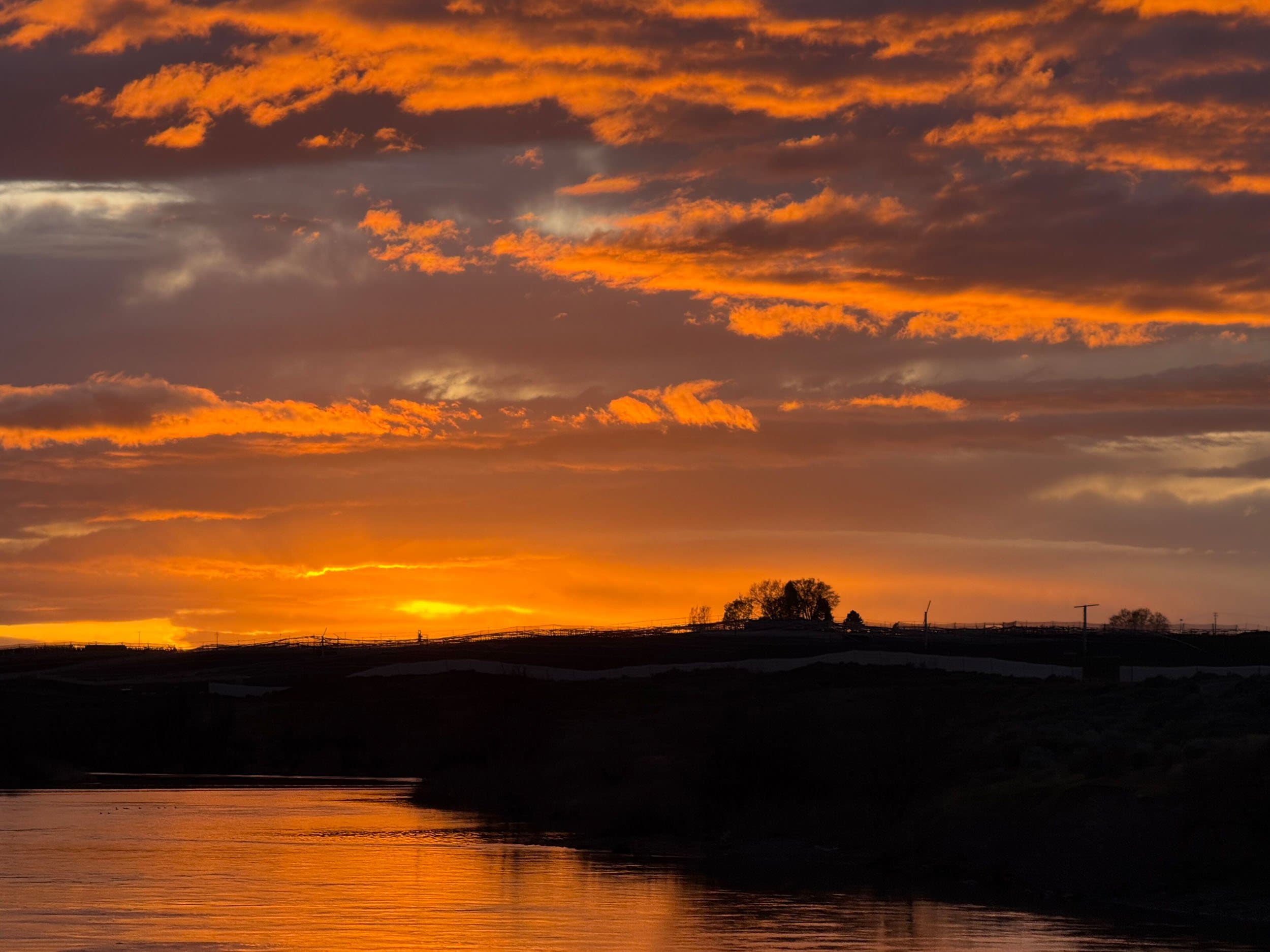 a sunset over water